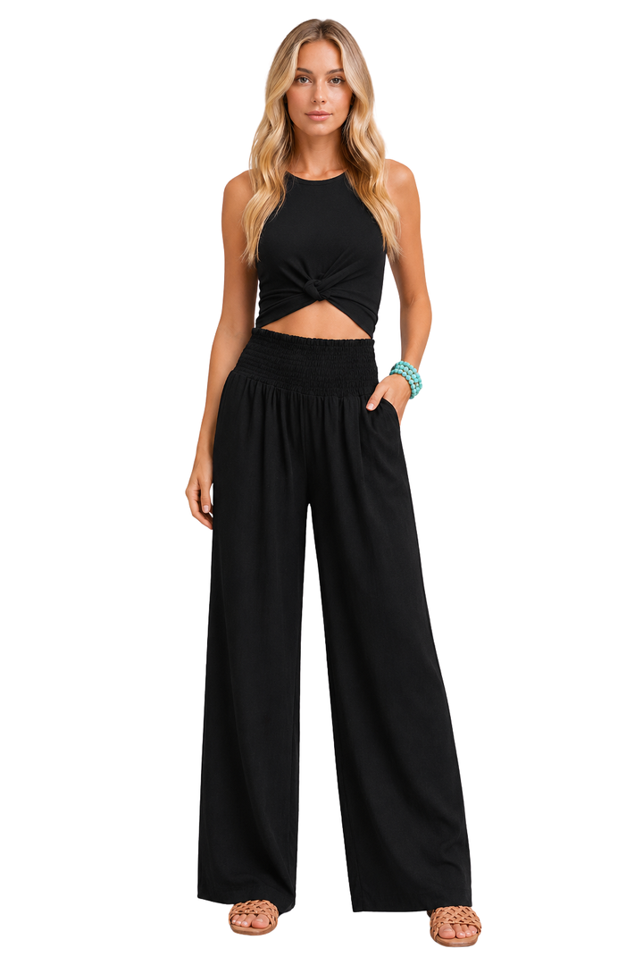 Boho style women's wide leg linen trousers with a shirred elastic waist for summer comfort.