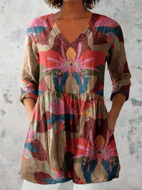 Women's flowy long-sleeve blouse with elegant V-neck, multicolor pattern, and loose fit, perfect for casual or stylish wear.