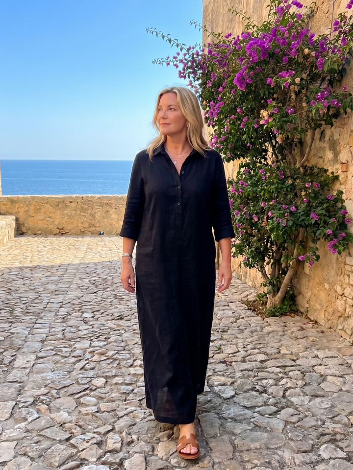Chic women's relaxed long sleeve maxi dress. Flowy fabric, collared & buttoned, perfect for versatile styling.