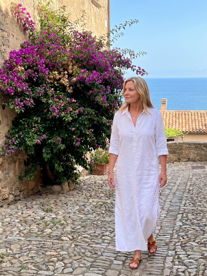 Flowy long sleeve maxi dress for women. Relaxed fit offers comfort, while collar & buttons add elegant style.