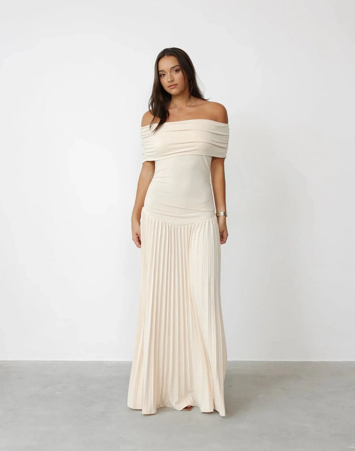 Women's flowy off-shoulder maxi dress with a pleated summer skirt.