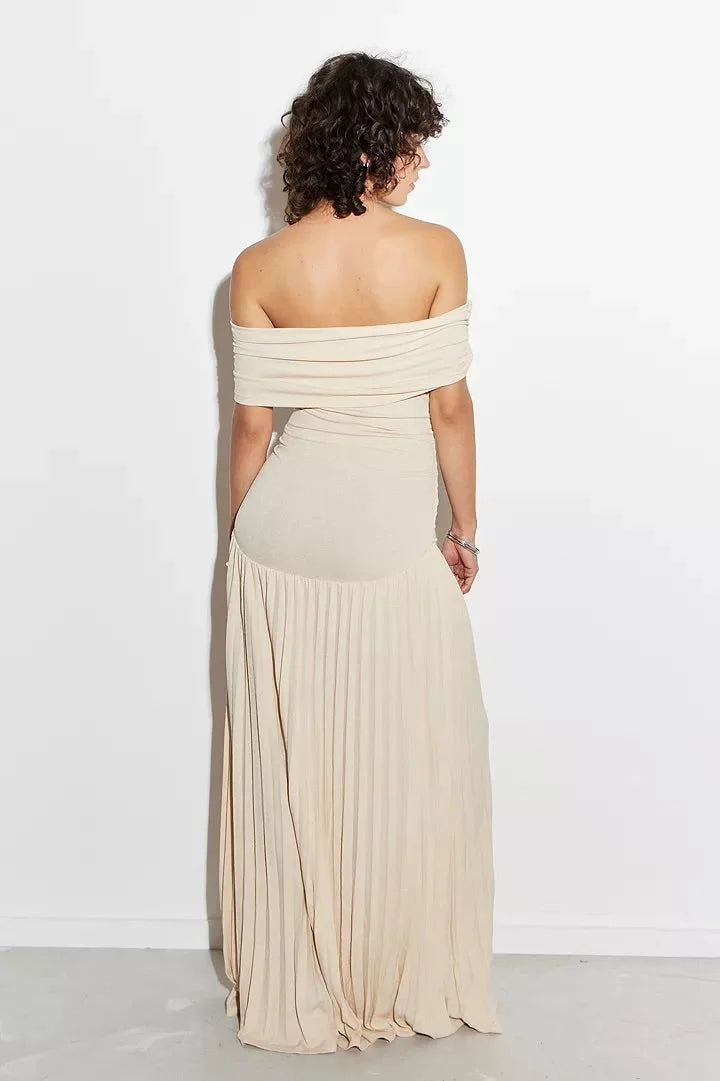 Vacation-ready women's off-shoulder maxi dress, flowy with pleated skirt.