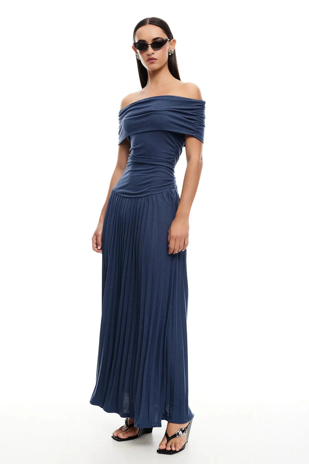 Cream off-shoulder maxi dress, elegant flowy pleated design for summer.