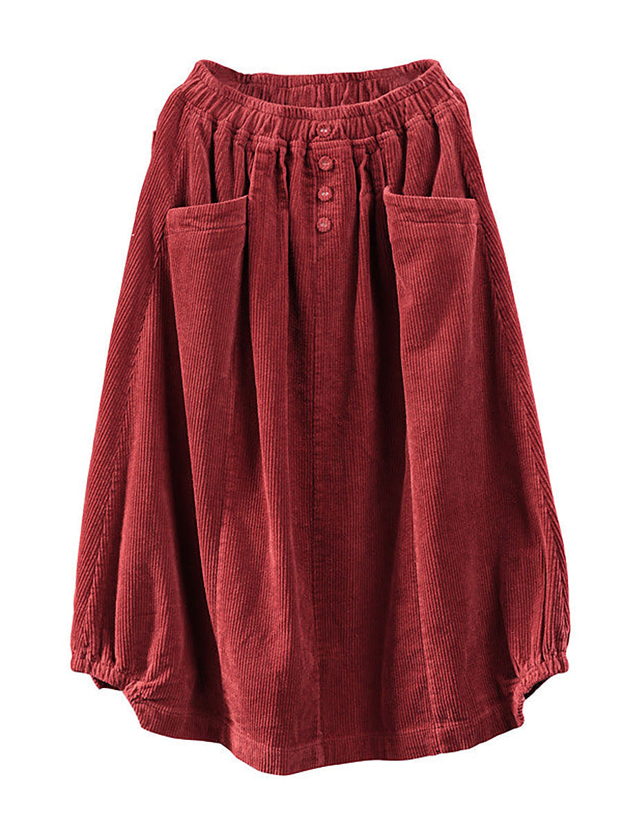 Flowy pleated maxi skirt for women, detailed with functional buttons and deep pockets, perfect for fashion.