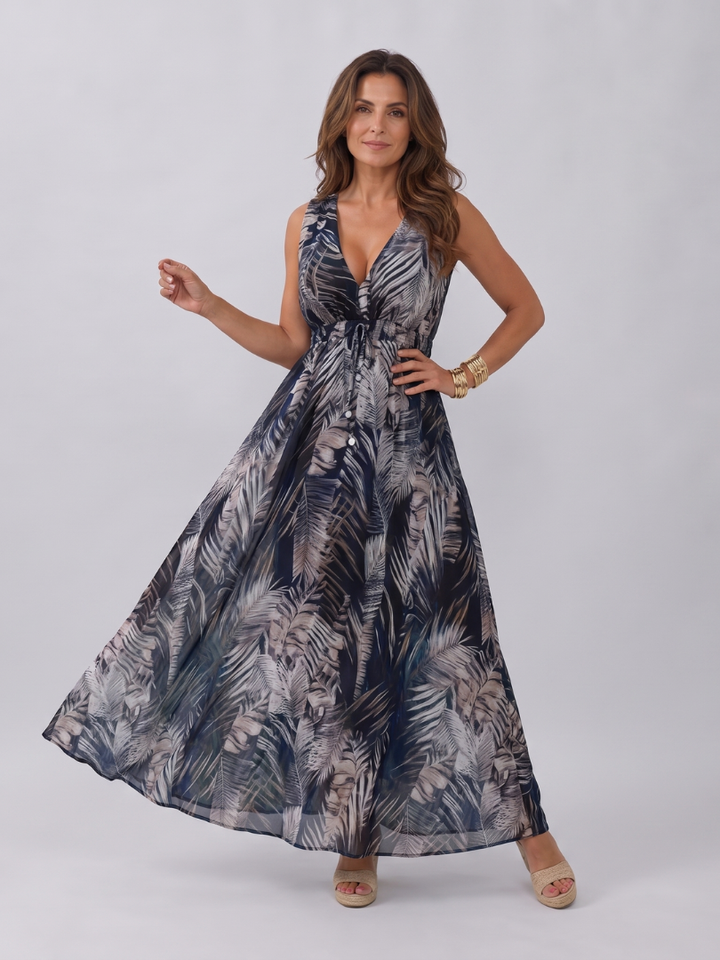 Relaxed fit flowy empire waist midi dress for women, a comfortable sleeveless summer style.