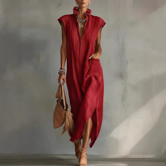 Elegant women's sleeveless flowy midi dress. Casual summer style with a unique asymmetrical hem and V-neck.
