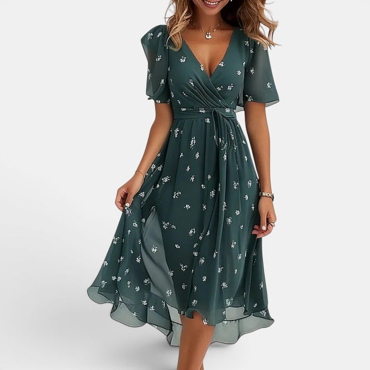 Women's flowy sleeveless summer dress, perfect for beach or casual wear, offering effortless comfort and style.