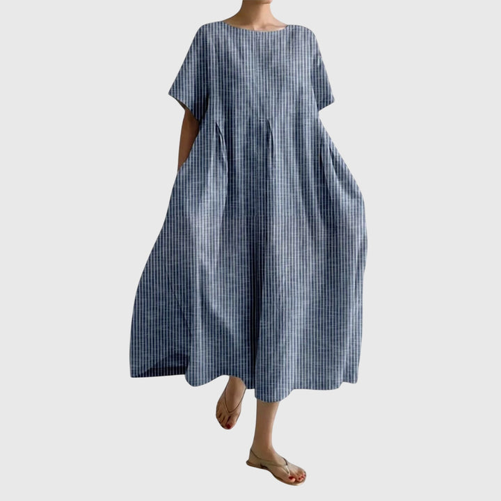 Comfortable women's striped maxi dress. Flowy design for casual summer wear & effortless everyday style.