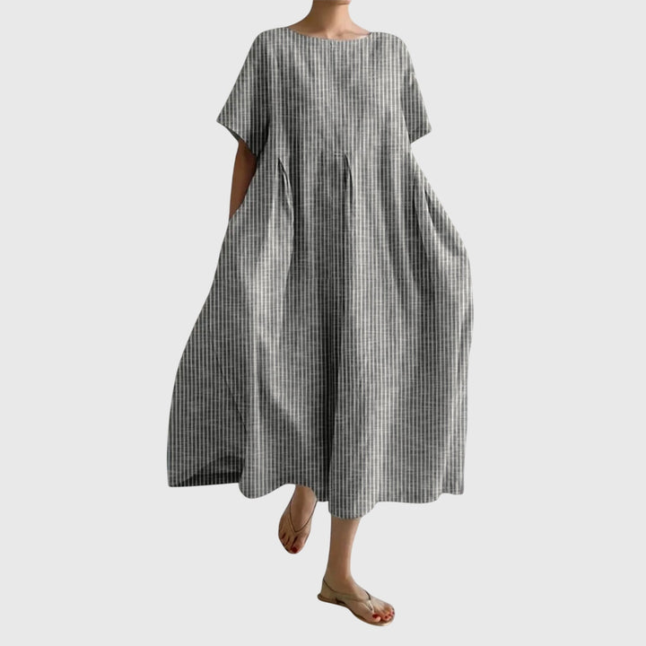 Elegant yet casual women's long striped summer dress. Flowy fabric for a comfortable & stylish everyday look.