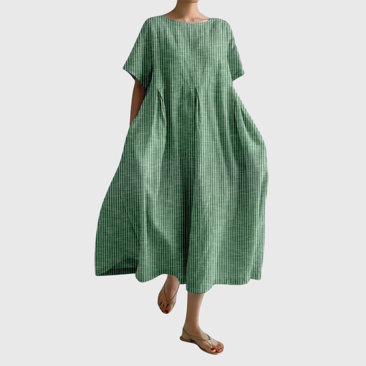 Effortless women's striped maxi dress. Flowy casual long dress perfect for versatile summer & everyday fashion.