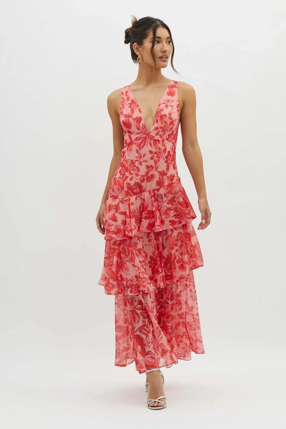 Stylish women's flowy maxi dress, intricately patterned with flattering layers and a comfortable V-neck.