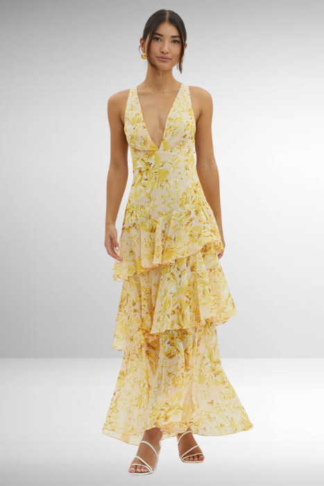 Elegant patterned flowy tiered maxi dress for women, sleeveless and perfect for warm weather fashion.