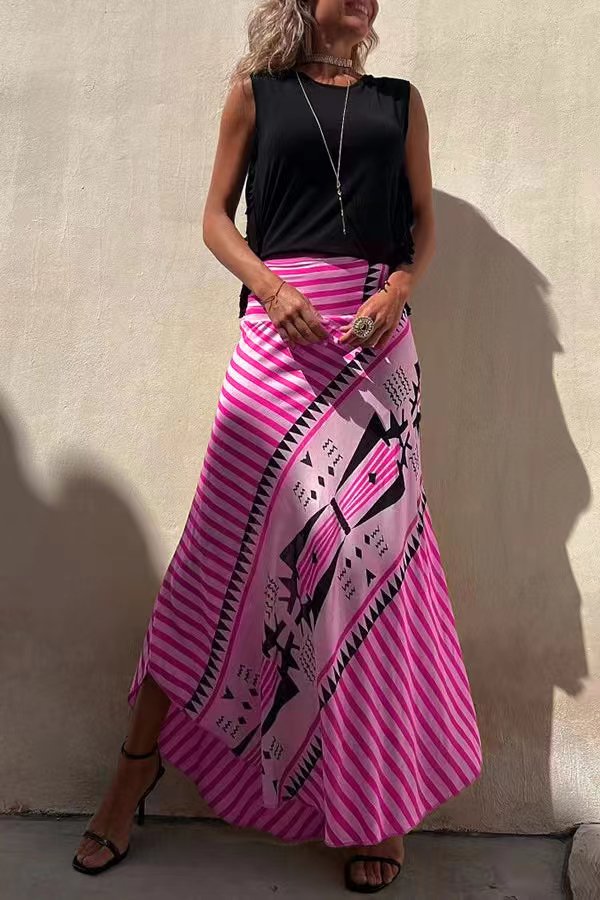 Texture detail of a women's soft, flowy tiered pleated skirt, emphasizing its comfortable fabric.