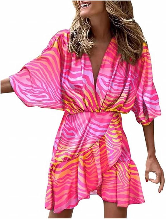 Beautiful women's flowy tiered ruffled maxi dress in a bohemian style, perfect for summer days.
