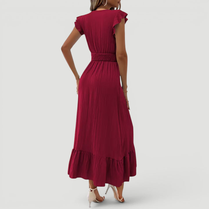 Women's summer evening maxi dress, flowy, V-neck, with a graceful flared hem.