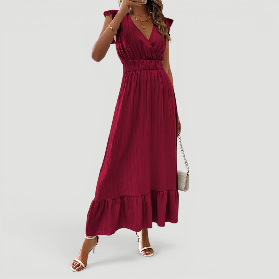 Elegant long women's V-neck maxi dress, flowy, perfect for summer vacations & evening wear.