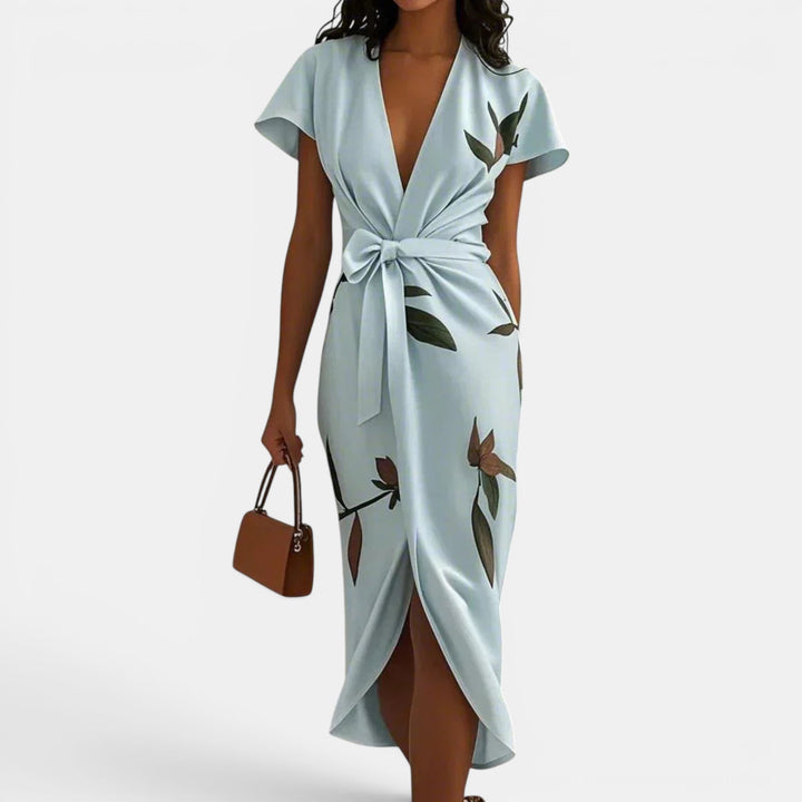 Elegant flowy V-neck wrap dress for women, ideal for summer events. Lightweight & chic spring fashion.