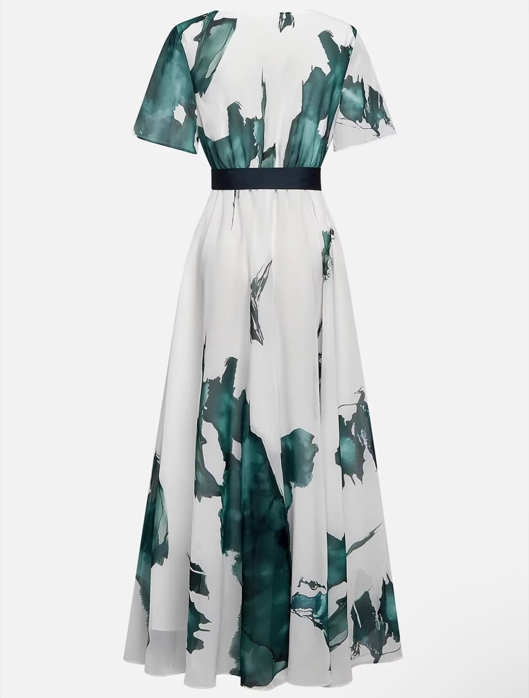 Graceful women's flowy long dress with a vibrant watercolor print. Elegant and comfortable for special occasions.