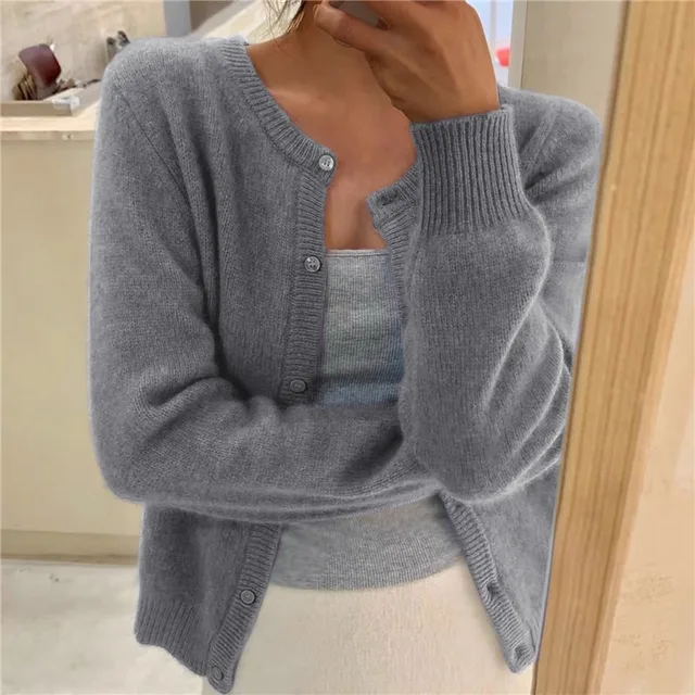 Women's fluffy knit cardigan with round neck & button front, ideal for fall/winter layering.