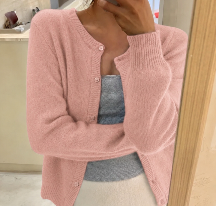 Luxuriously soft women's fluffy knit cardigan, round neck & button front. A cozy winter essential.