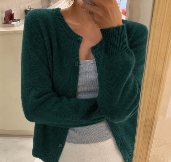 Button-front women's fluffy knit cardigan, round neck. Versatile, cozy, and chic for any outfit.
