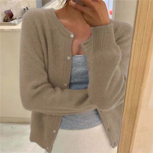 Stylish women's fluffy knit cardigan, round neck & button front. Versatile for casual or chic layering.