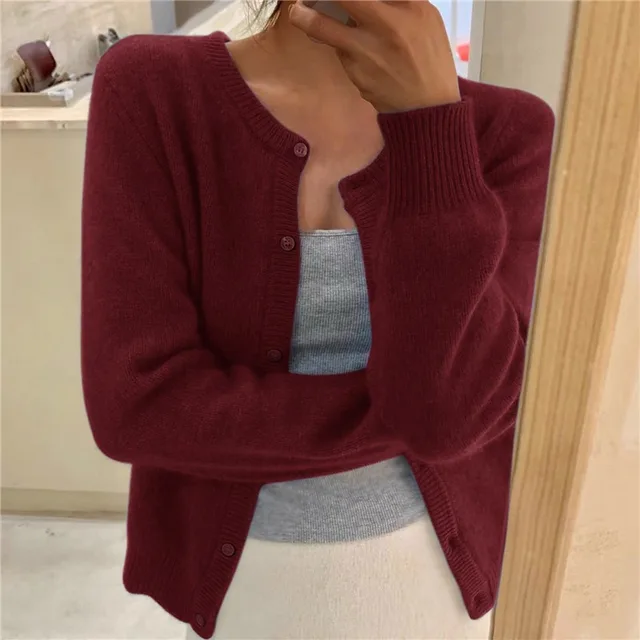 Plush women's fluffy knit cardigan with a round neck and button front. Perfect cozy sweater for chilly days.