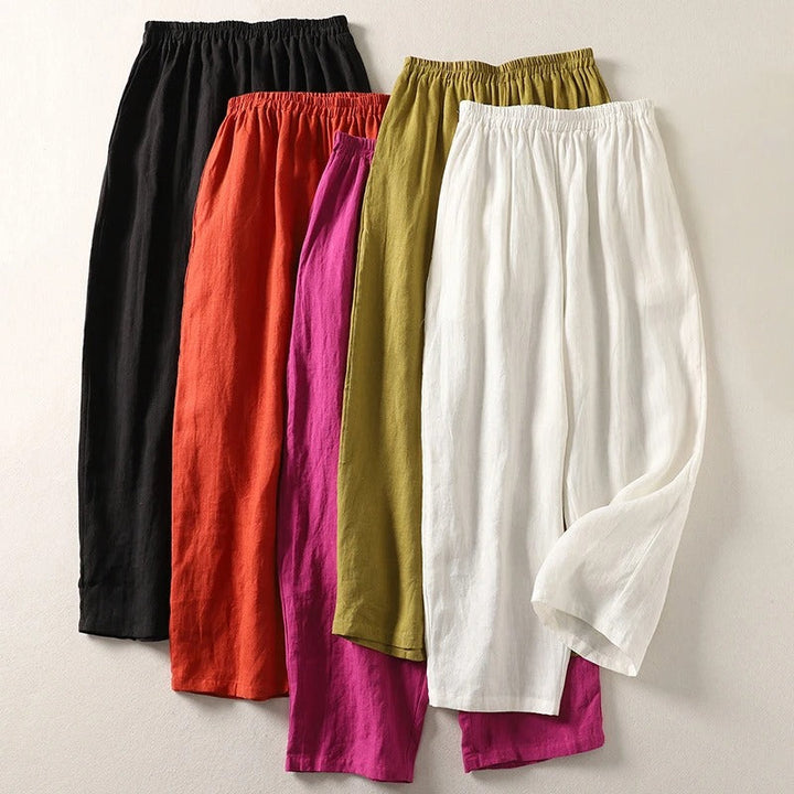 Relaxed fit fluid cotton blend wide-leg trousers for women, ideal for casual or elegant looks.