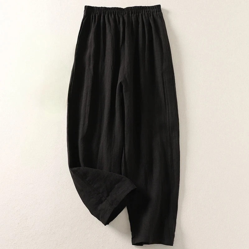 Pull-on women's fluid cotton blend wide-leg trousers, offering ultimate comfort and style.