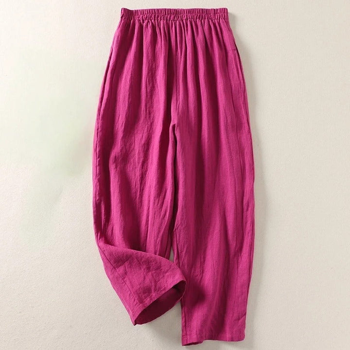 Stylish women's fluid cotton blend wide-leg trousers, great for summer casual or travel outfits.