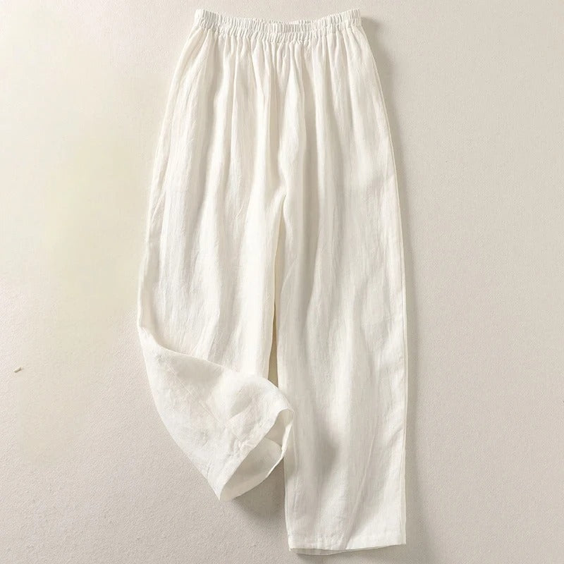 Elegant women's wide-leg cotton blend pants, featuring a fluid drape and comfortable design.