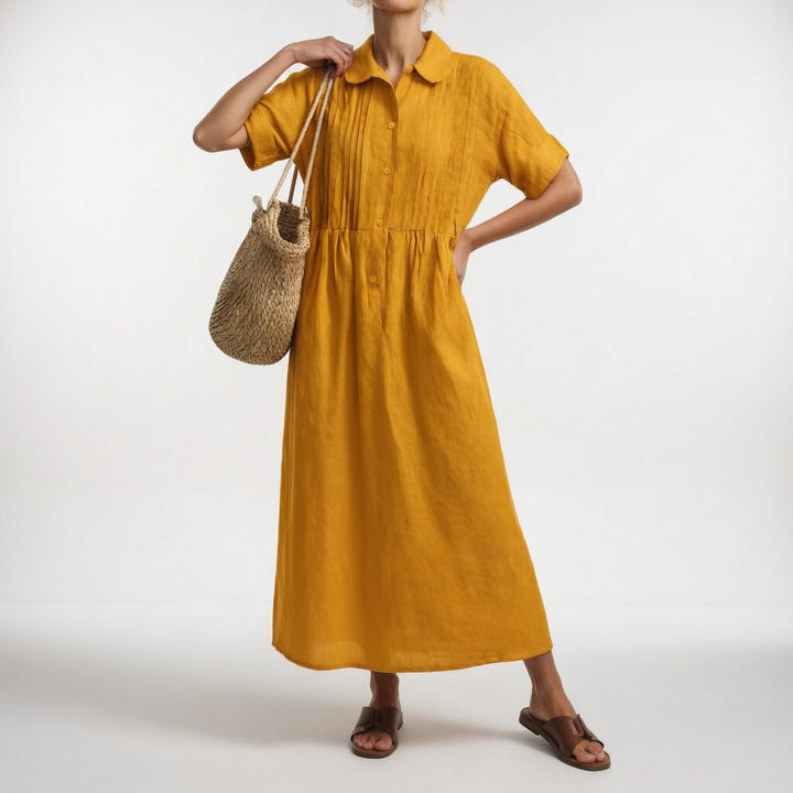 Button front women's summer dress, versatile for day wear & vacation style.