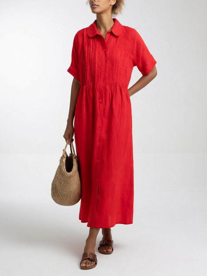 Comfortable women's fluid summer dress, perfect for relaxed, stylish warm-weather outfits.