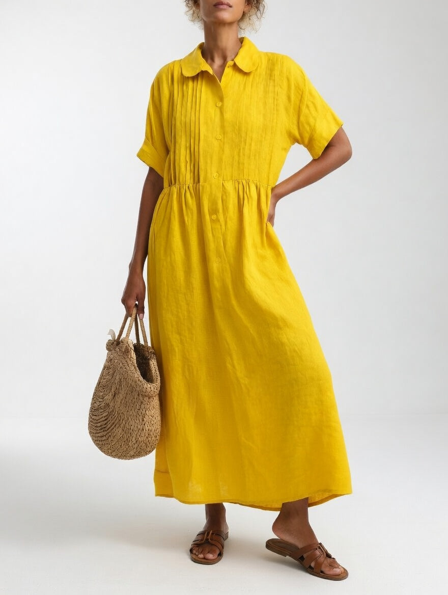 Long flowy women's summer shirt dress, an elegant & comfortable casual option.