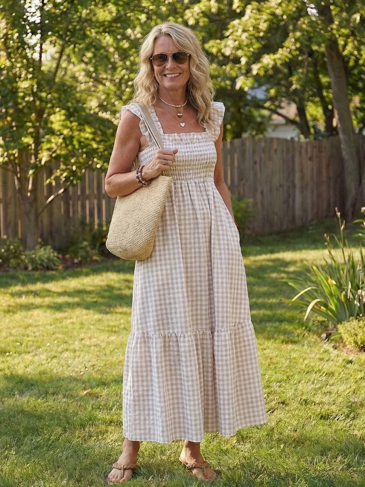 Women's flutter sleeve smocked gingham maxi dress with square neckline and tiered skirt, perfect for summer casual wear.