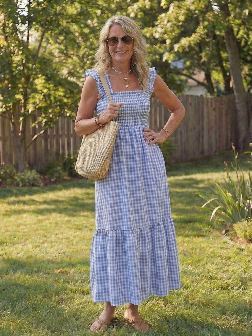 Stylish women's flutter sleeve smocked gingham maxi dress; a comfortable, elegant choice for summer casual wear.