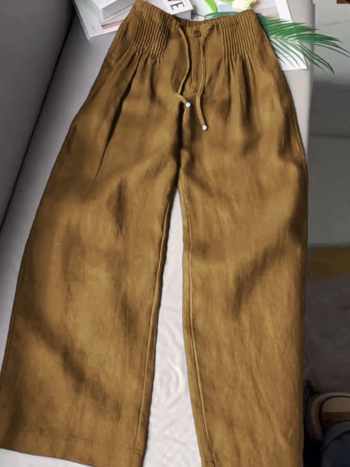 Comfortable women's full-length straight leg trousers. Easy pull-on style with elastic waist and drawstring.