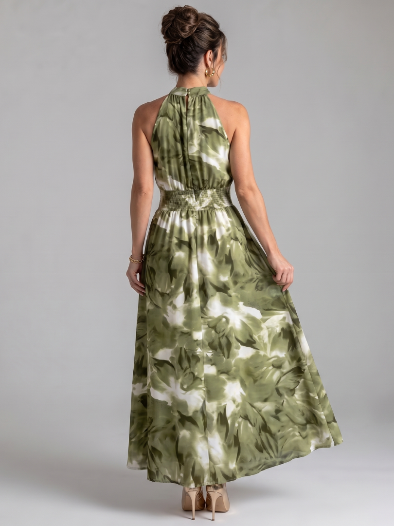 Casual women's abstract print midi dress with gathered waist. Perfect for summer days.