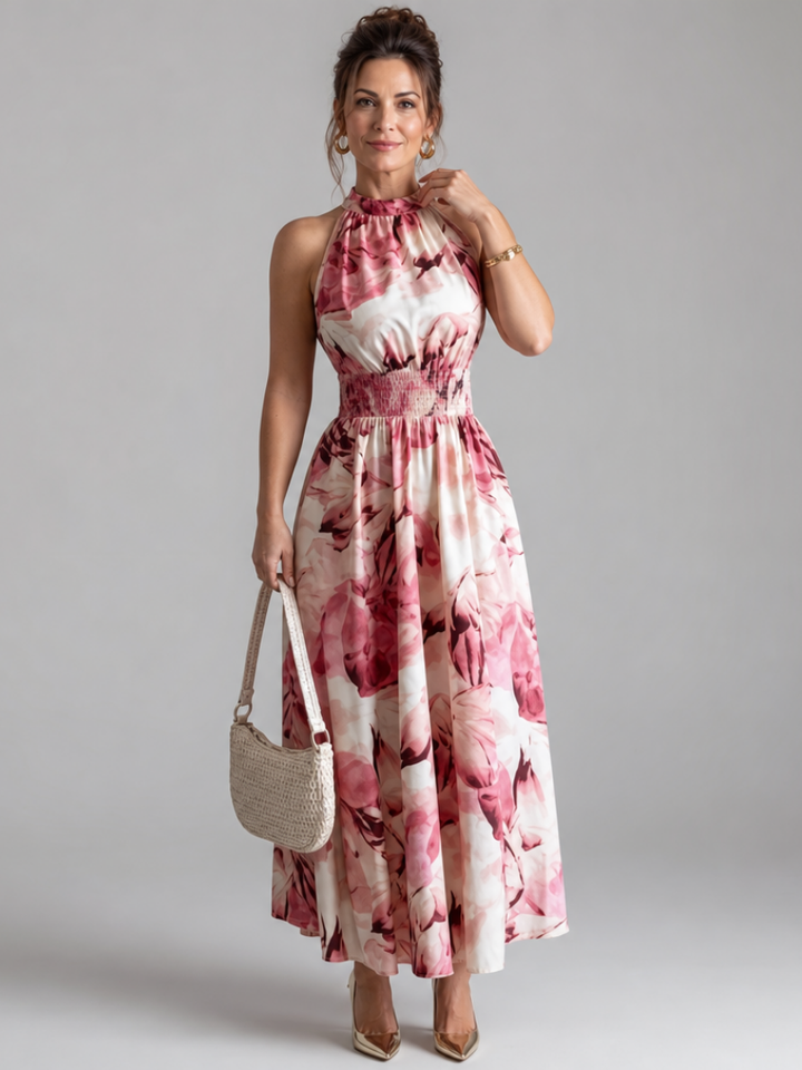 Soft, flowing fabric of an abstract print women's midi dress with gathered waist.