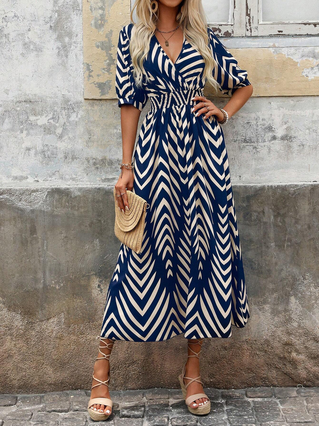 Women's vibrant geometric print boho summer dress, perfect for relaxed outings and effortless fashion.