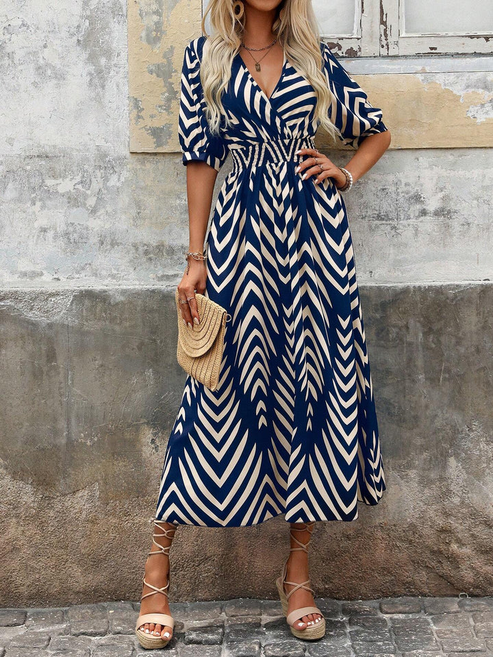Women's vibrant geometric print boho summer dress, perfect for relaxed outings and effortless fashion.