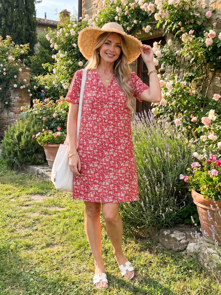 Women's knee-length geometric print V-neck dress, short sleeves, perfect for casual summer days.
