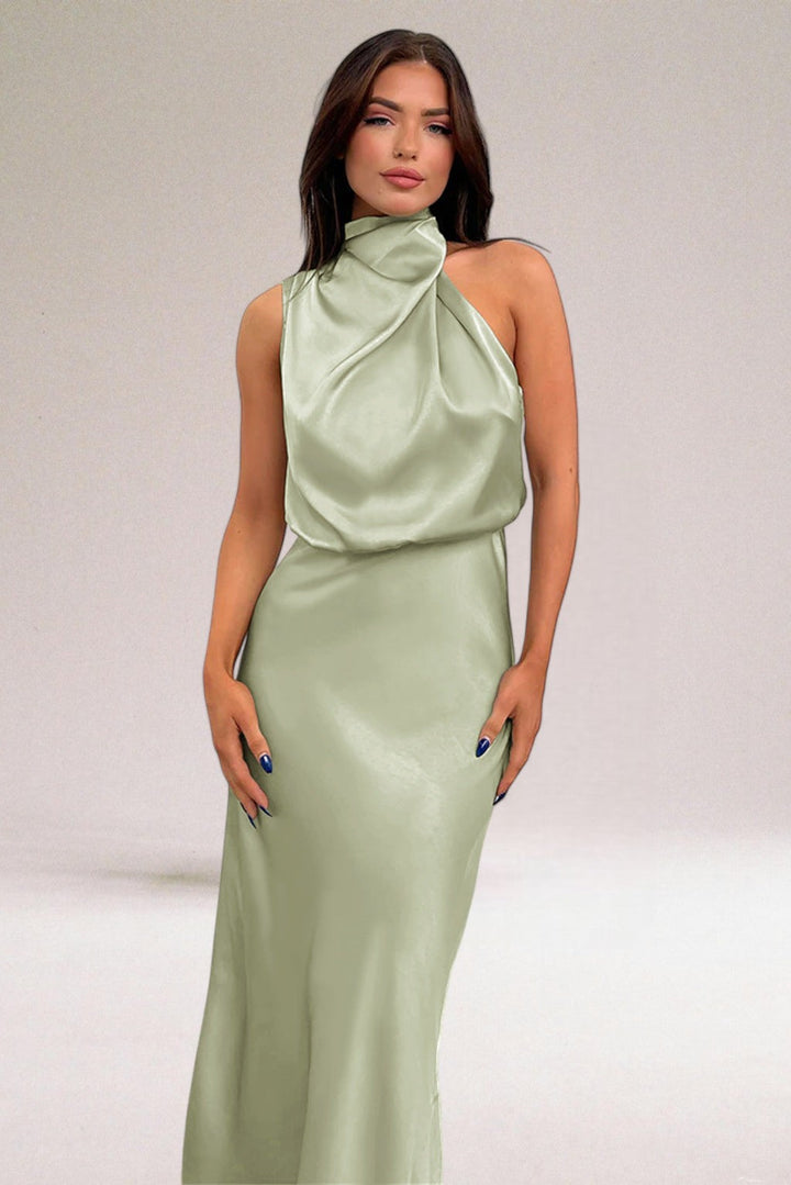 Women's glamorous halter neck maxi dress. Elegant formal evening gown for special occasions & parties.