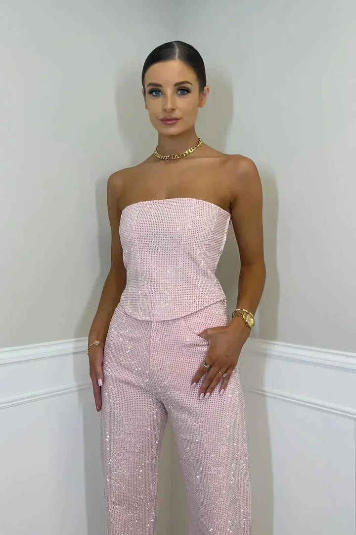 Dazzling women's party wear: sequin corset top & wide leg pants set, a glamorous evening outfit choice.