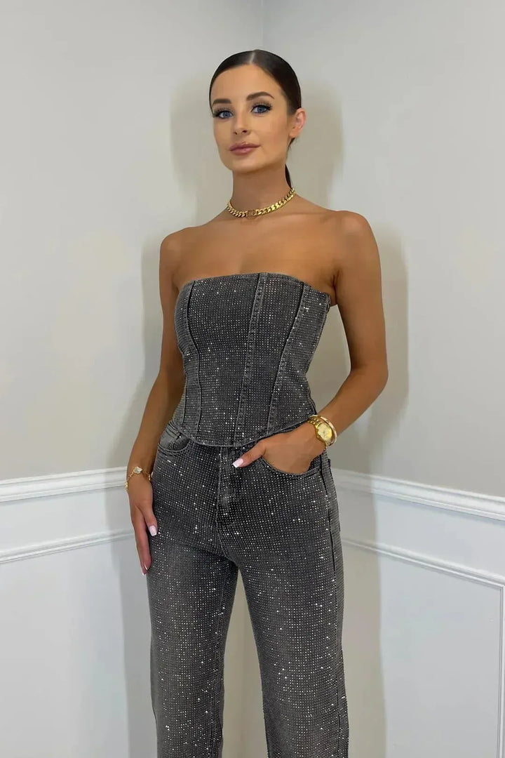 Statement women's sequin two-piece set: corset top & wide leg pants for a luxurious evening look.