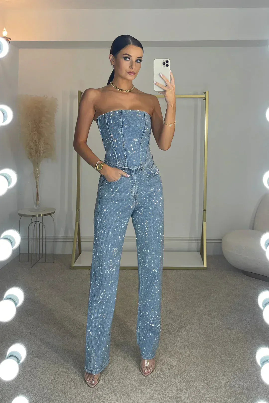 Flowing wide leg pants fabric detail from women's sequin set, ensuring comfort and style for evening events.