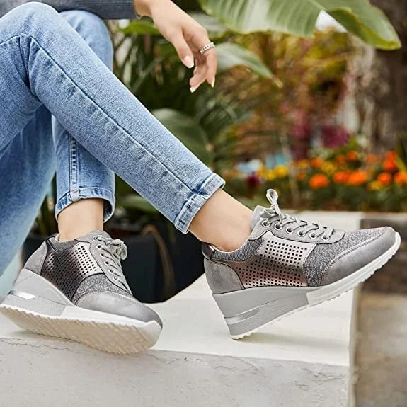 Fashion-forward women's glitter lace-up platform wedge sneakers. Combine comfort & sparkle.