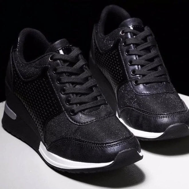 Sparkling women's platform wedge sneakers. Lace-up design, glitter finish for a casual, elevated look.