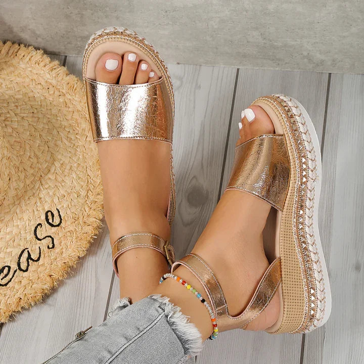 Women's metallic espadrille sandals with adjustable ankle strap. Orthopedic comfort, perfect for summer flats.