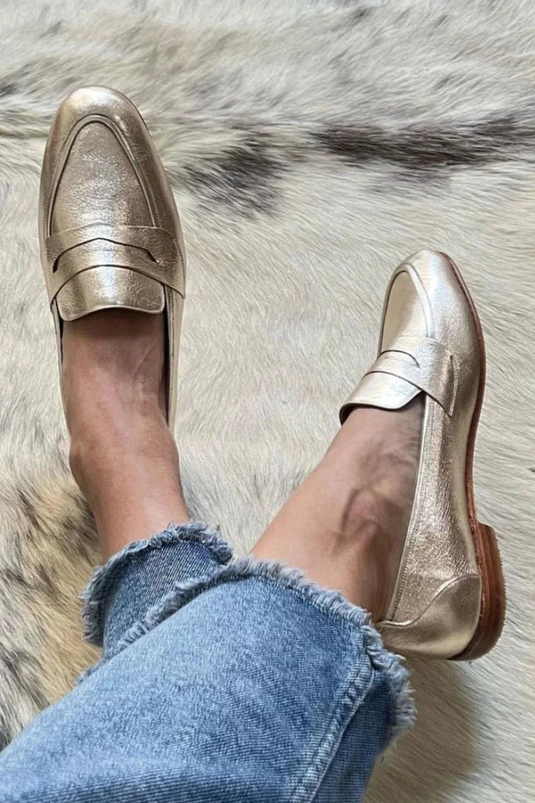 Women's gold metallic pointed-toe slip-on penny loafers, elegant and comfortable flats for versatile fashion.